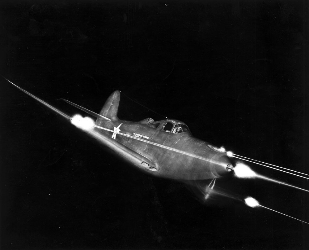 bell_p-39_airacobra_in_flight_firing_all_weapons_at_night.thumb.jpg.2d659129665610e0a709d557fdda4258.jpg