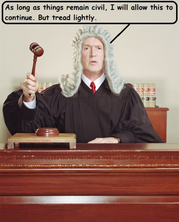 Judge-sitting-at-bench-holding-gavel.jpg