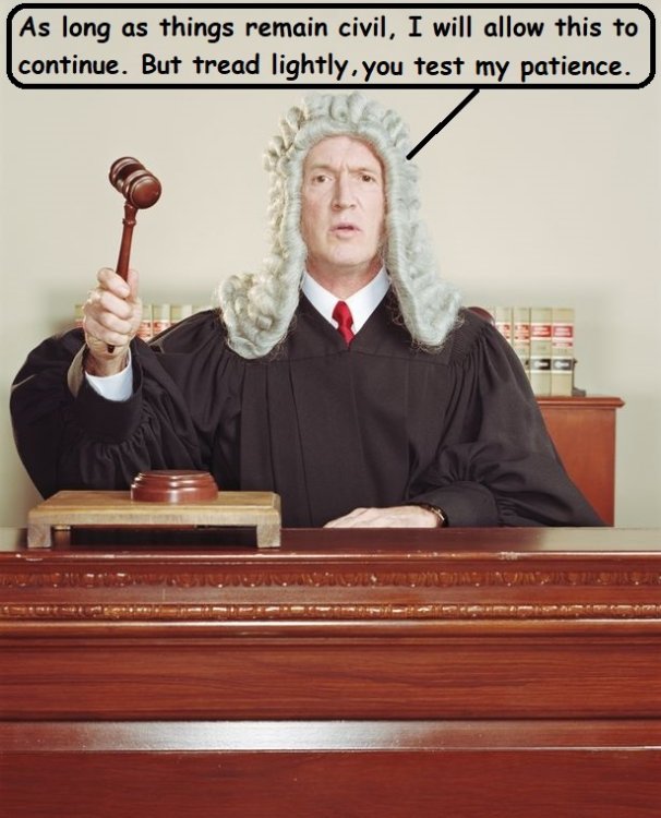 Judge-sitting-at-bench-holding-gavel.jpg