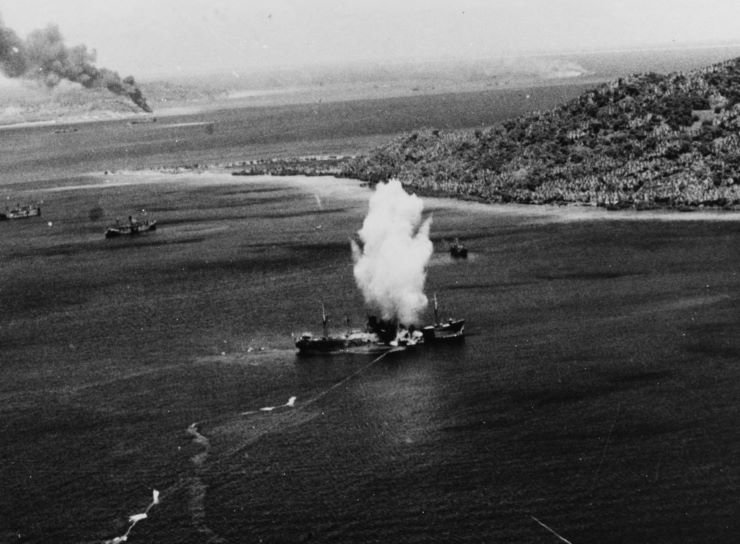 JapanesefreightertorpedoedbyUSSYorktownAvengeratTruk.jpg.1919e1f737f06add5116379cb2cd520a.jpg
