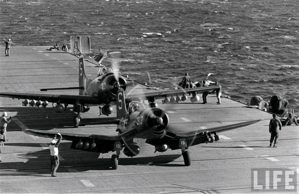 AD-2-Skyraider-White-S409-with-F4F-4B-Corsair-VF-53-White-313-aboard-USS-Essex-Korea-Jan-1952-01-2140625385.thumb.jpg.204ac62bc99349fd9c5697f205a98f76.jpg